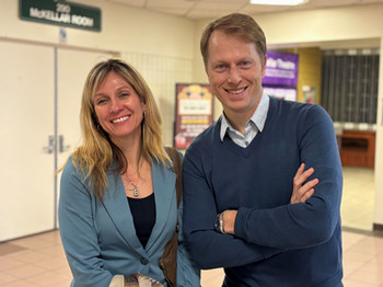 Image of Bobbi Ann Brady and Alex Marland outside of The Wave restaurant on campus